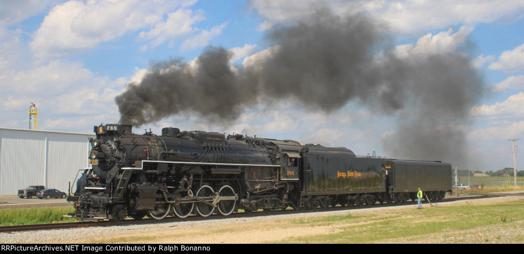 Just outside of town, the 765 takes on water prior to charter trips the next day 